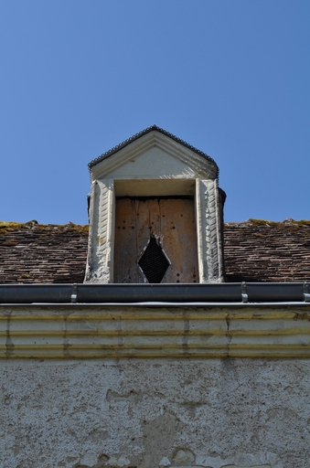 Détail d'une lucarne du logement.